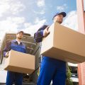 movers-carrying-boxes-93cc8aff