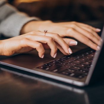 female-hands-typing-computer-key-5ba2f34d