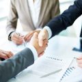 handshake-close-up-executives (1)-c14ff9d0